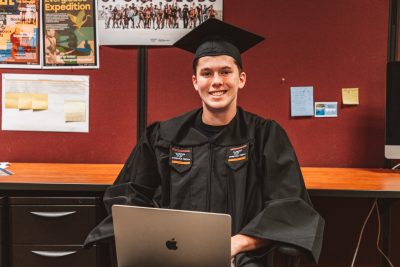 Topher Wagner at his desk in McComas Hall